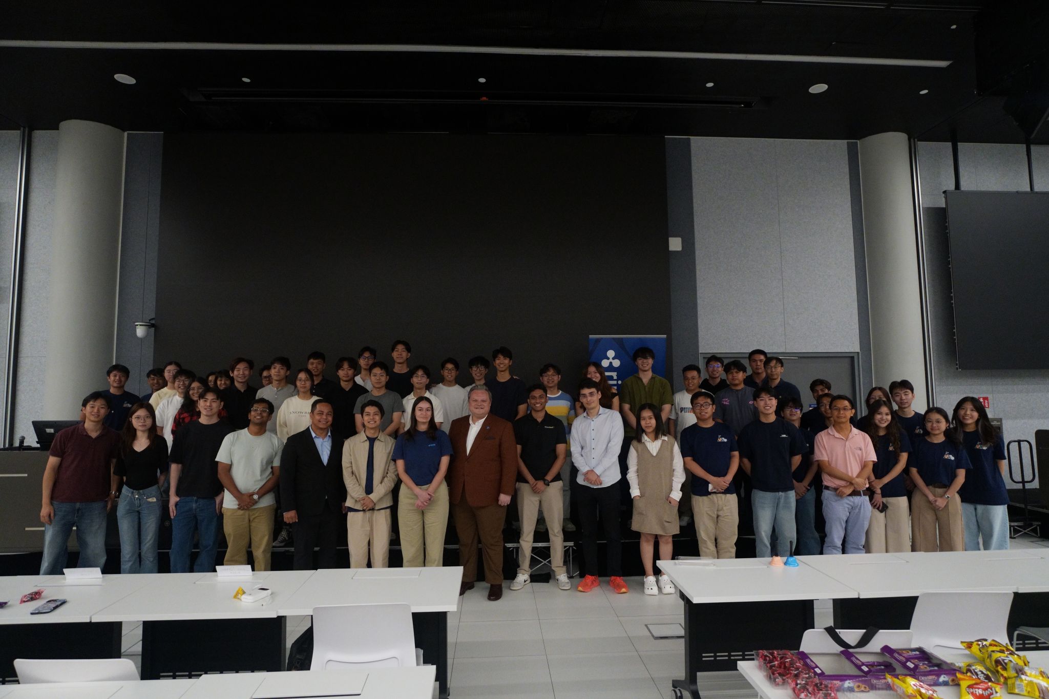 Group photo — participants and speaker